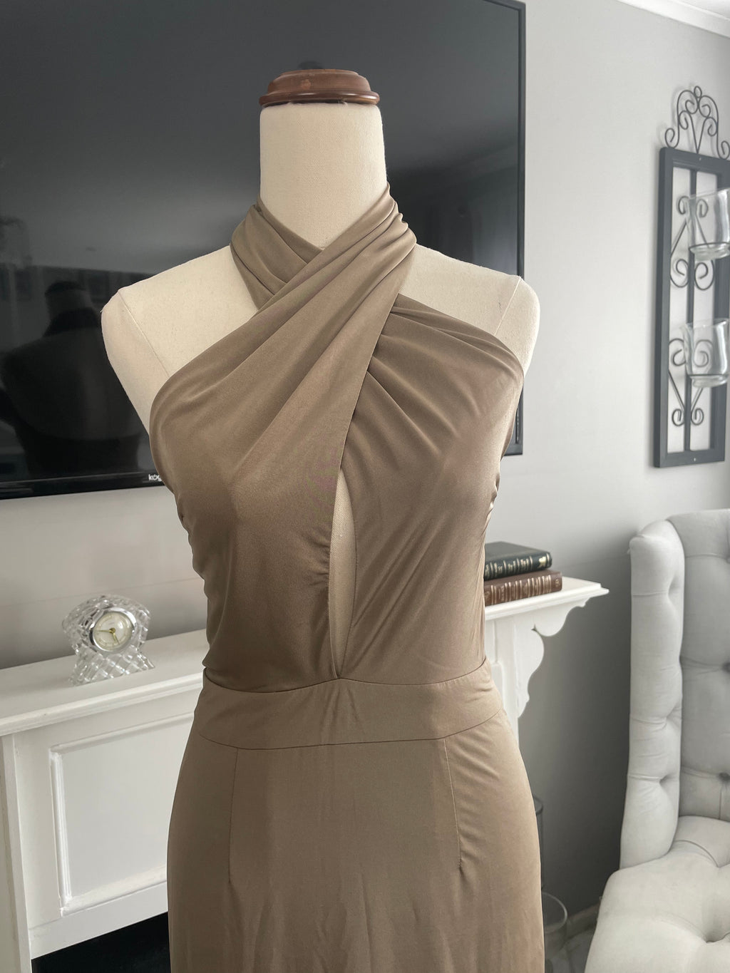 close up of Elle Zeitoune brown slinky formal gown maxi length