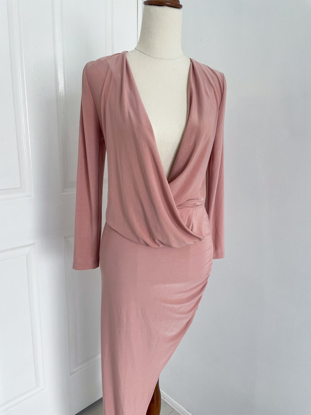 Abyss by Abby pink bluch formal gown with drape front chest, long sleeves and high thigh split