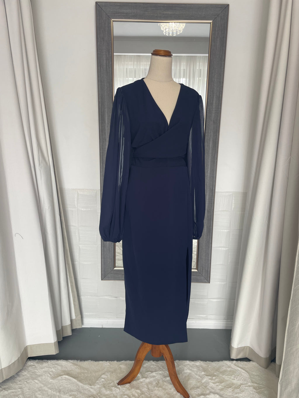 Plus size royal blue midi dress with sheer arms and a wrap around waist