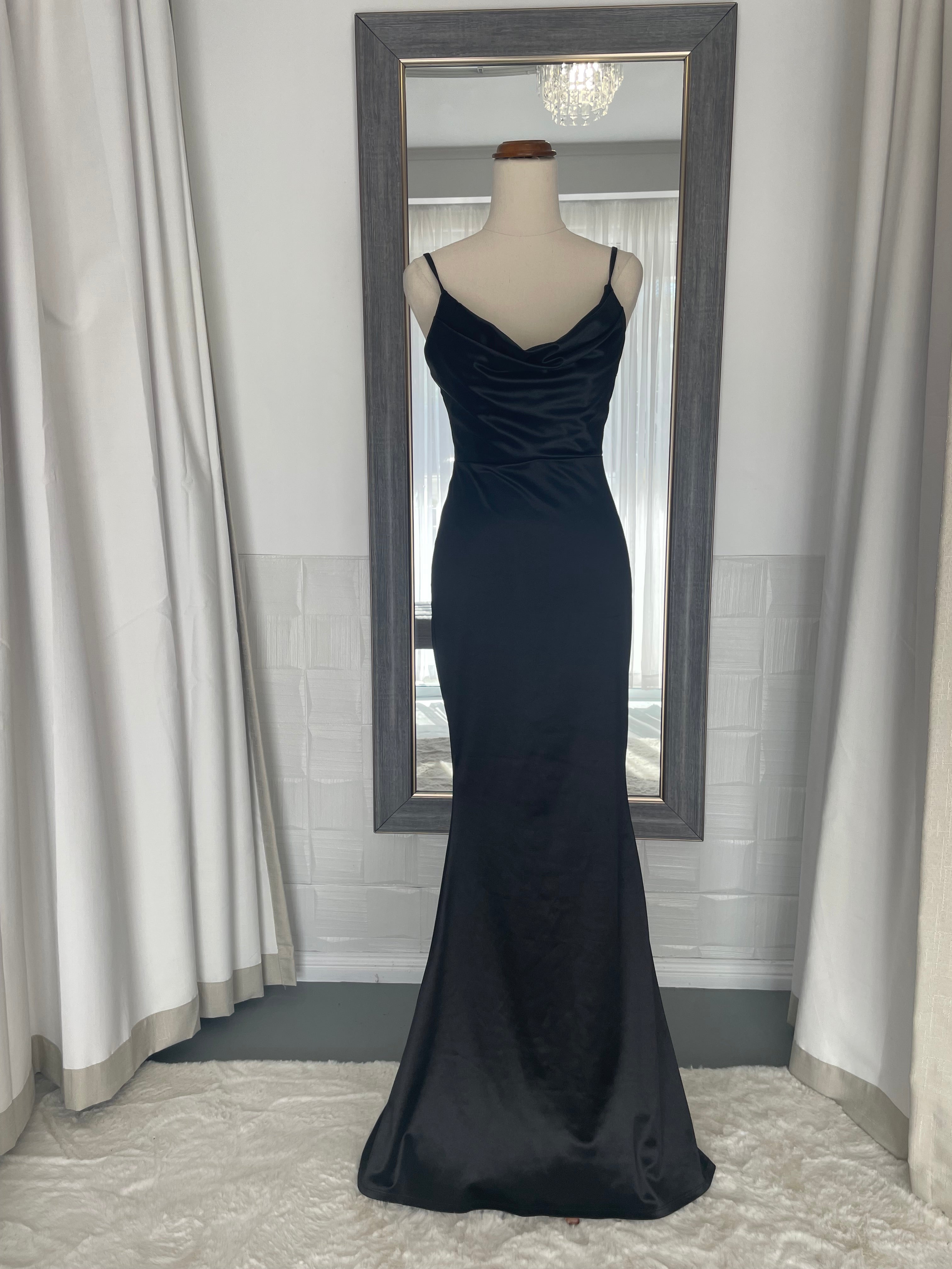 Black satin floor length gown with a draping cowl neck 