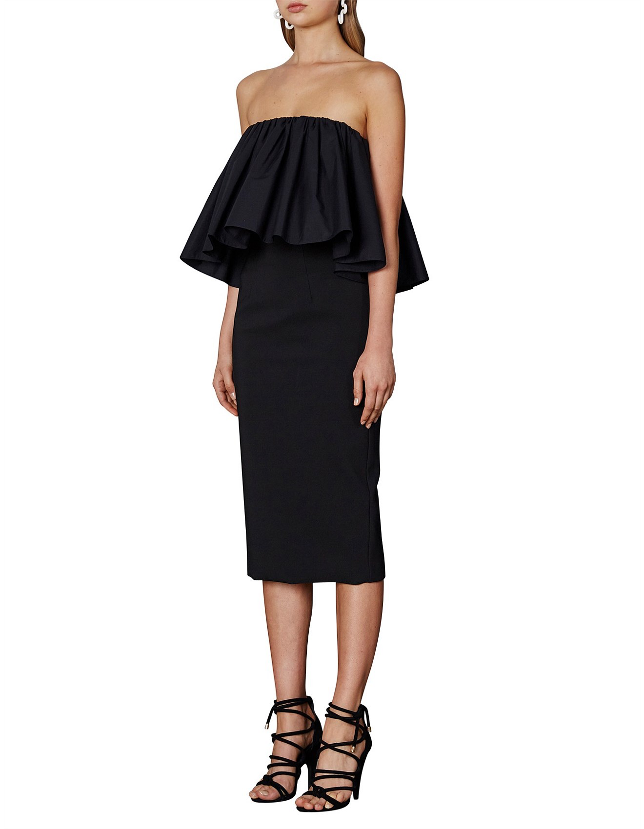 Black strapless dress with layered peplum top on a white background