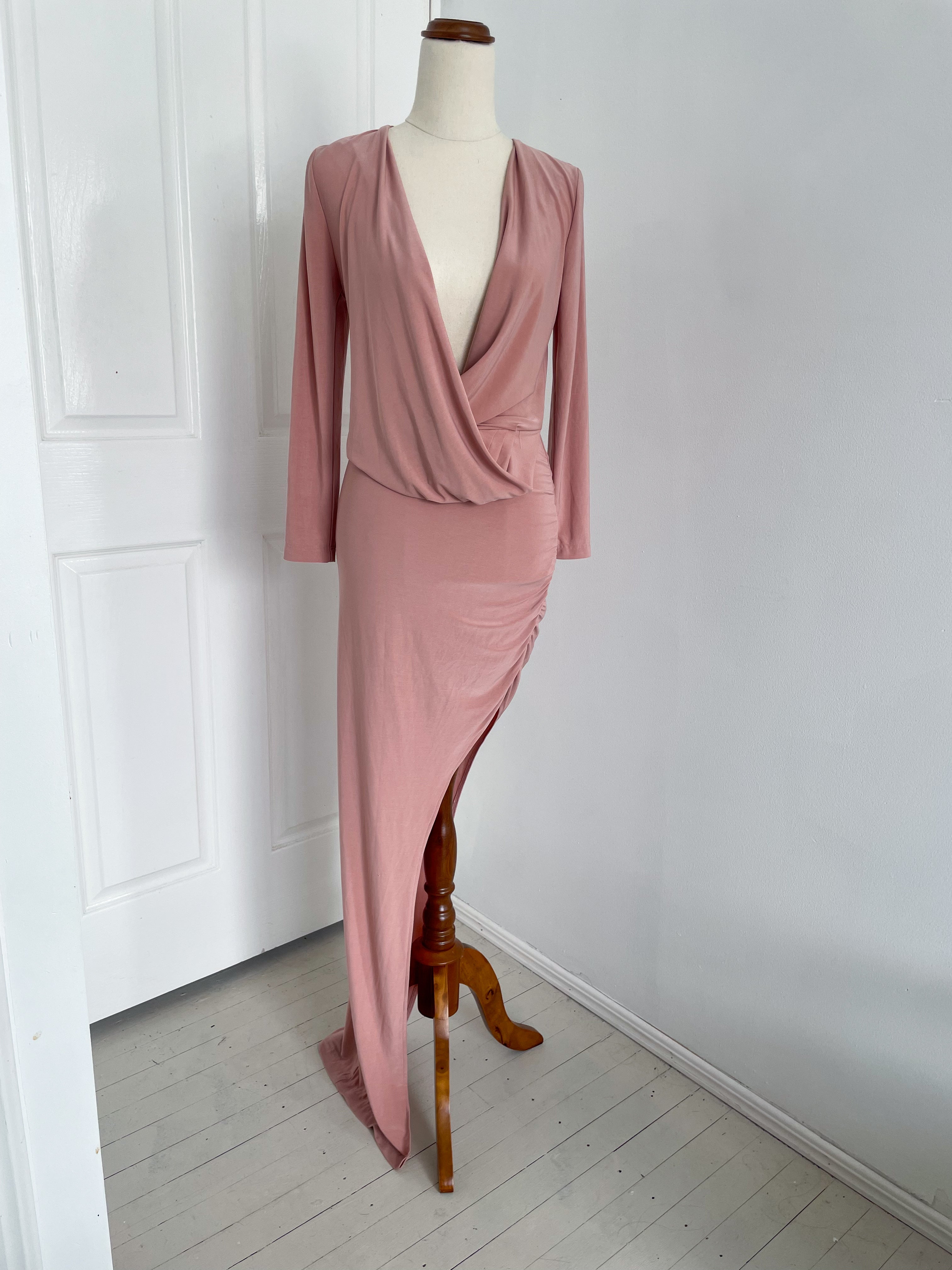 Abyss by Abby pink bluch formal gown with drape front chest, long sleeves and high thigh split