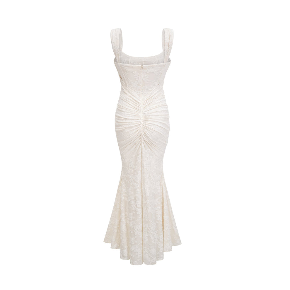 White evening gown with ruched design on a white background