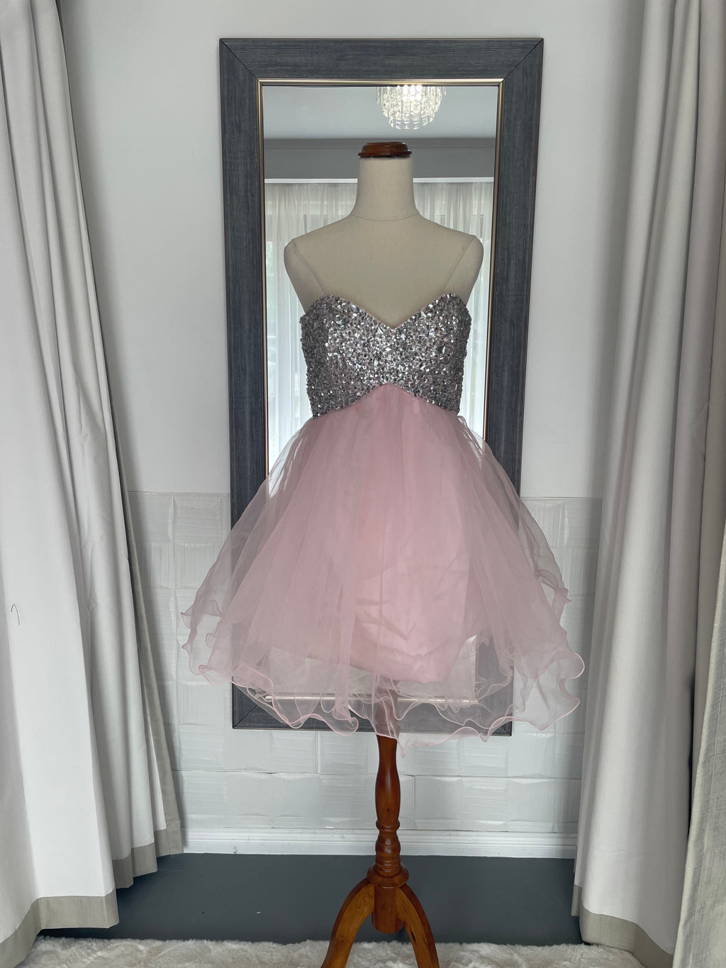 front of Pink mini dress with tulle skirt and diamante crystal sequin bust