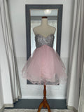 front of Pink mini dress with tulle skirt and diamante crystal sequin bust